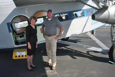 Clarksville Mayor Kim McMillan and Clarksville Regional Airport Manager John Patterson are all smiles after a thrilling ride on the 1929 Ford Tri-Motor aircraft now on display at the airport. Rides on the plane are available through Sunday.