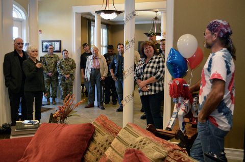 Volunteer Scott Snyder presents a custom-made rocking horse to the Fort Campbell Fisher House Oct. 13 in honor of former Rakkasan, Sgt. 1st Class Tony Knier, who was killed in Iraq in 2006. Soldiers from the Iron Rakkasans, BACH, and family friends joined Knier’s mother at the presentation ceremony honoring her son. Knier served at Fort Campbell in 1997 with 3rd Battalion, 187th Infantry Regiment, 3rd Brigade Combat Team, 101st Airborne Division - “Iron Rakkasans”. (Maria Yager)