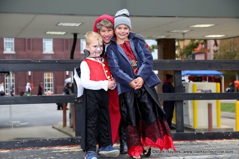 Clarksville Mayor Kim McMillan congratulates two of the costume contest winners.