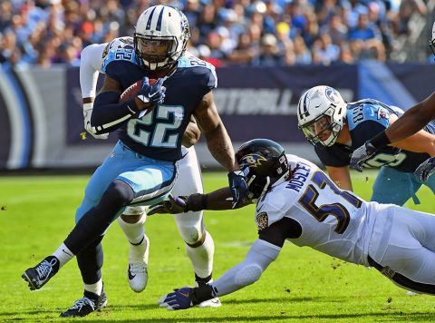Tennessee Titans running back Derrick Henry (22) runs for a short gain during the first half against the Baltimore Ravens at Nissan Stadium. (Christopher Hanewinckel-USA TODAY Sports)