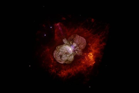 Eta Carinae's great eruption in the 1840s created the billowing Homunculus Nebula, imaged here by Hubble. Now about a light-year long, the expanding cloud contains enough material to make at least 10 copies of our Sun. Astronomers cannot yet explain what caused this eruption. (NASA, ESA, and the Hubble SM4 ERO Team)