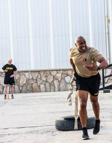 Command Sgt. Maj. Anthony McAdoo of the 101st Airborne Division (Air Assault) Resolute Support Sustainment Brigade participates in the sprint/drag/carry event for the Army Combat Fitness Test in Bagram, Afghanistan 14 August. (1st Lt. Verniccia Ford, 101st Airborne Division (AA) Sustainment Brigade Public Affairs)
