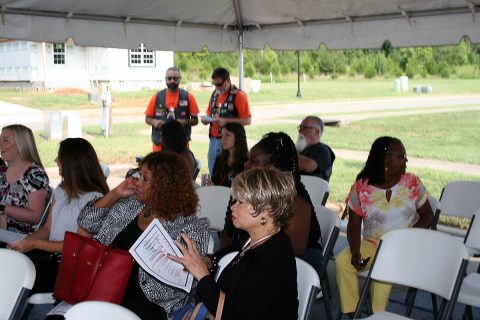 People attending the Veterans Housing Ribbon Cutting.