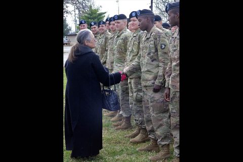 Amy Gallo, a Gander widow, shakes hands with 2nd Brigade Combat Team, 101st Airborne Division (Air Assault) Soldiers Wednesday, December 12th, 2018, following the final remembrance ceremony at Task Force 3-502nd Memorial Park at Fort Campbell, Kentucky. (Maria Rice McClure, Fort Campbell Courier/Fort Campbell Public Affairs) 