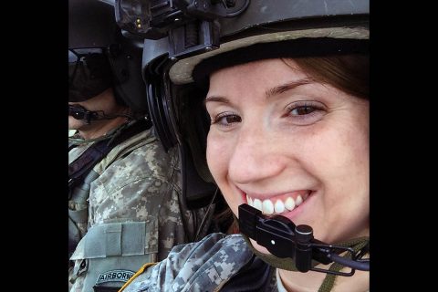 Special Forces Chaplain Capt. Delana Small in an OH-58 Kiowa Warrior helicopter shortly before the active component divested the airframe in 2017. (Gary Sheftick, Defense Media Activity - Army)