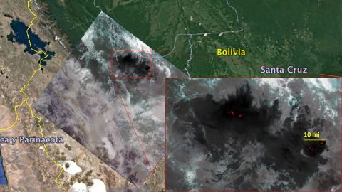 ECOSTRESS imagery of fires burning in the Bolivian Amazon on Aug. 23, 2019. Red areas show regions hotter than the sensor was designed to measure (approximately 220 degrees Fahrenheit, or 104 degrees Celsius). Dark wispy areas indicate thick smoke. (NASA/JPL-Caltech)