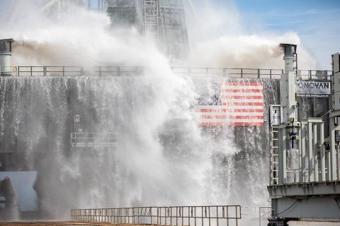 About 450,000 gallons of water poured onto the Pad B flame deflector, the mobile launcher flame hole and onto the launcher’s blast deck during NASA's water flow test. (NASA/Frank Michaux)