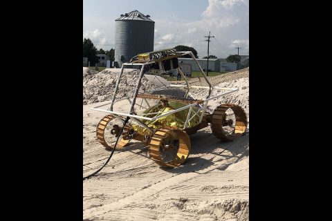 Pictured here is a VIPER mobility testbed, an engineering model created to evaluate the rover’s mobility system. The testbed includes mobility units, computing and motor controllers. Testing involves evaluating performance of the rover as it drives over various slopes, textures and soils that simulate the lunar environment. (NASA/Johnson Space Center)