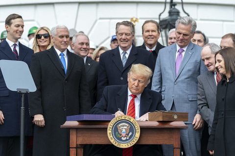 President Donald Trump signs the United States-Mexico-Canada Trade Agreement. (Official White House Photo by D. Myles Cullen)