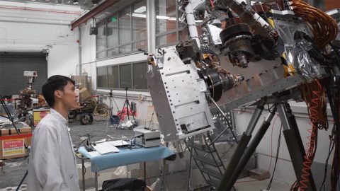 JPL engineers monitor testing of the Perseverance rover's Sample Caching System. (NASA/JPL-Caltech)