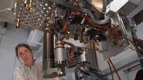 JPL engineers monitor testing of the Perseverance rover's Sample Caching System. (NASA/JPL-Caltech)