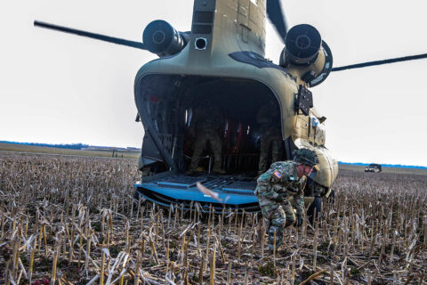 U.S. Army Lt. Col. Jeffrey Farmer, commander, 1st Battalion, 506th Infantry Regiment "Red Currahee", 1st Brigade Combat Team "Bastogne", 101st Airborne Division (Air Assault), exits the rear of a CH-47 Chinook helicopter at a landing zone during Toccoa Tough II, a leadership professional development course March 8-12, on post. (Sgt. Lynnwood Thomas) 