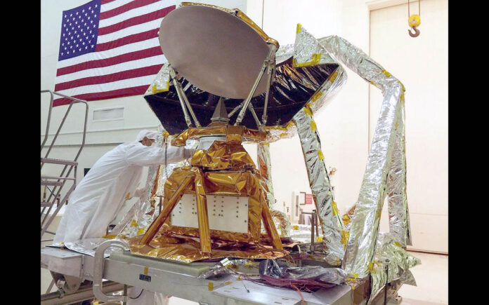 The COWVR instrument (center, wrapped in gold foil) in JPL's Environmental Test Laboratory during vibration testing. (NASA/JPL-Caltech)