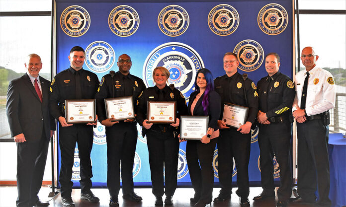 (L to R) Clarksville Joe Mayor Pitts, Sgt Mefford, Sgt Nesbitt, Sgt. Hill, Sydney Tate, Sgt. Walden, Deputy Chief Stalder, Chief Crockarell