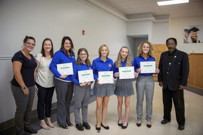 Emma Barber, Haley Harrison, Brystolyn French, Natalie Loreant, and coach Bridget Harding