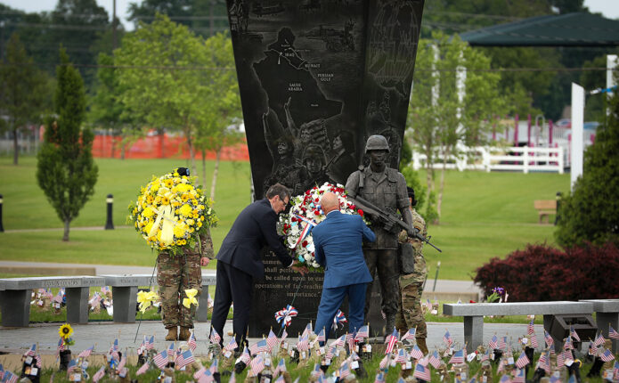 Mayors Jean-Pierre L’Honneur, of the City of Carentan, and Kees van Rooij, of Municipality of Meierijstad, lay a wreath on a memorial during a Wreath Laying Ceremony during the Week of the Eagles May 23rd, 2023. (Staff Sgt. Michael Eaddy) 