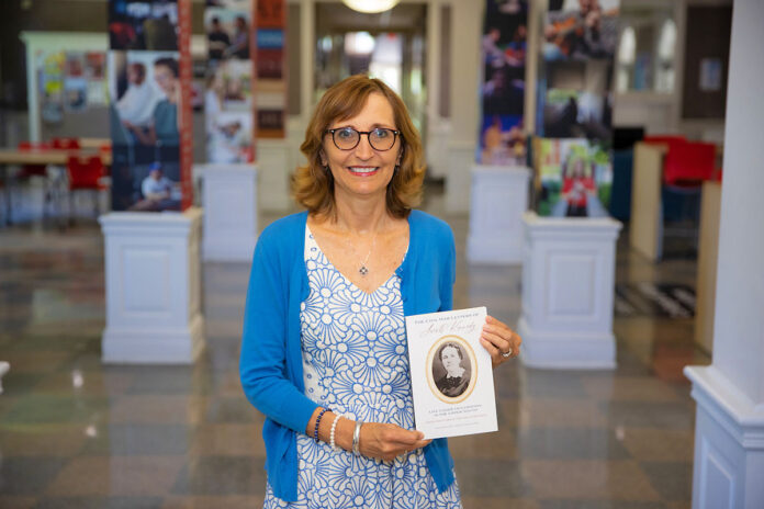 Austin Peay State University history professor Dr. Minoa Uffelman with her new book, 