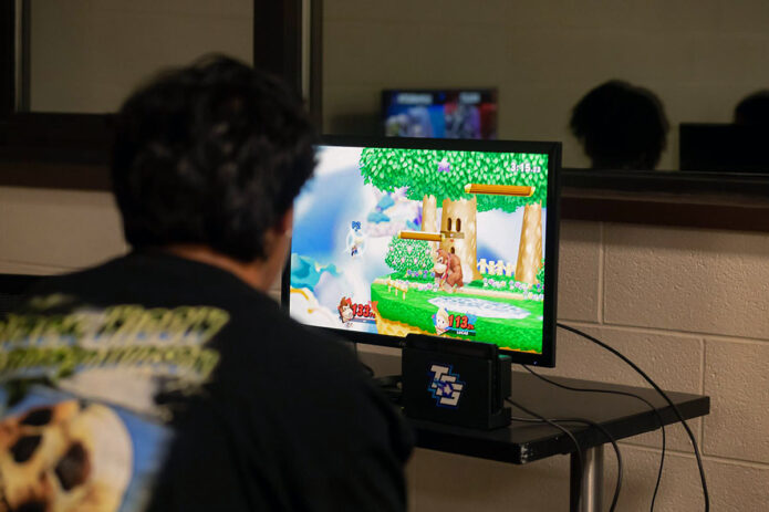 An Austin Peay State University student competes in a Super Smash Bros. tournament hosted by Ranked-Up Esports. (APSU)