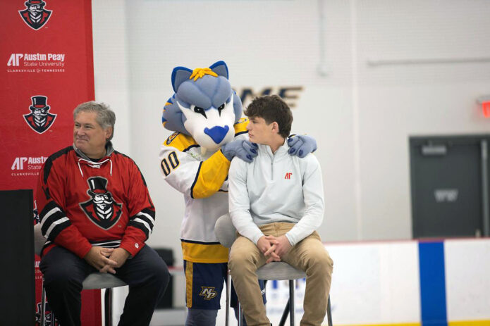 Gnash congratulates the club's first president, Cooper Smith. (APSU)