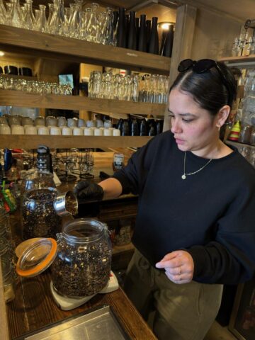 Lis Diaz measuring teas for a brew concentrate