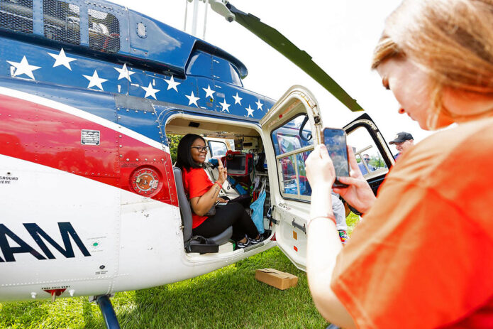 Students get a firsthand look inside a life flight helicopter at Tennova Healthcare during Austin Peay State University’s inaugural Aspiring Nurses Camp. (Sean McCully, APSU)