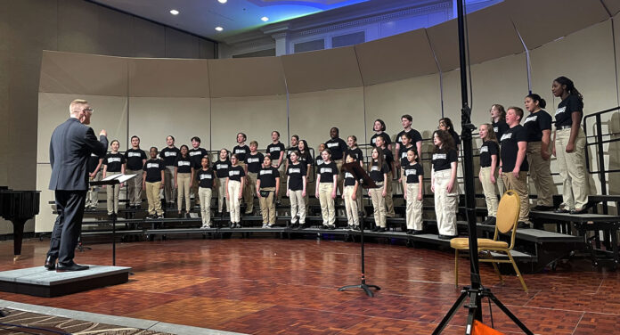 Dr. Michael Chandler directs the Clarksville Children’s Chorus during a performance at the Gaylord Opryland in Nashville as part of the 2024 TMEA Professional Development Conference. (APSU)